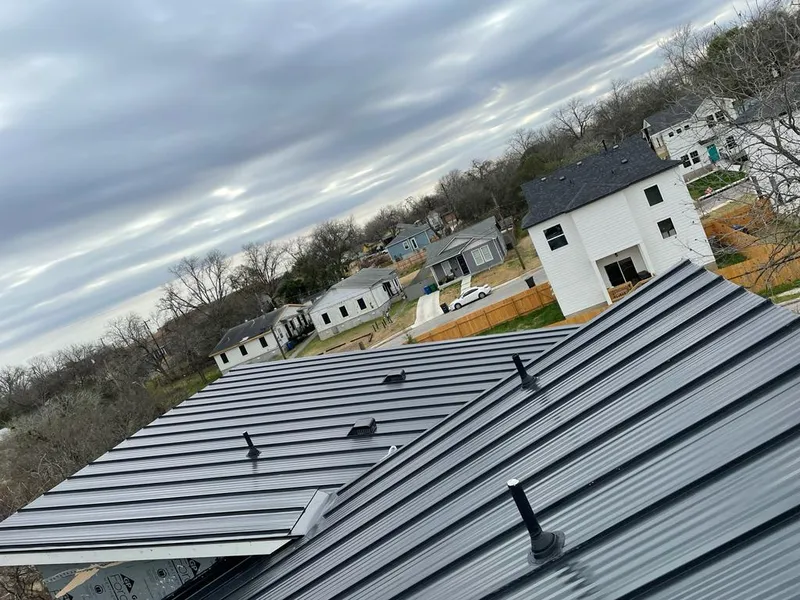 Standing seam metal roof panels with vents for Skylight Repair in Winfield